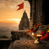Hanuman temple at sunrise with marigold garlands and a lit diya